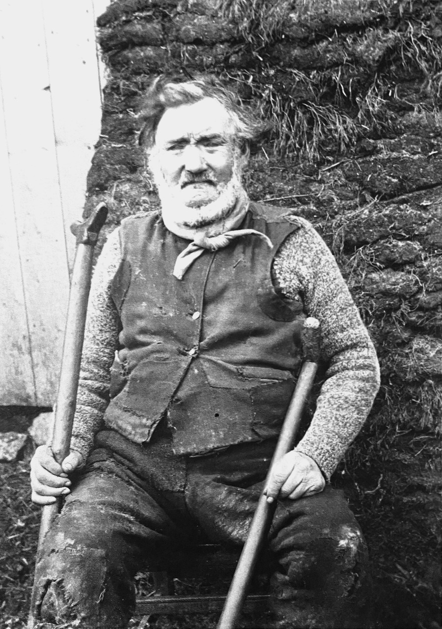 Picture of an elderly man sitting outside